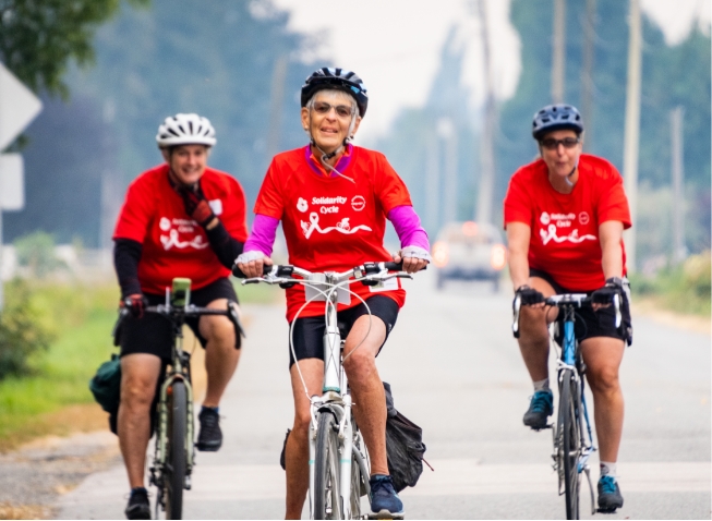 three women cycling outside