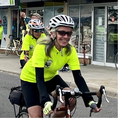 woman riding a bike on the road