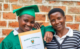 Angella and her mother on her graduation day at Kutumba School, part of Nyaka in Uganda.