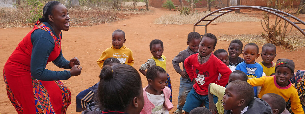 Gloria Nkoma, volunteer teacher and caregiver at a centre supported by CAVWOC.